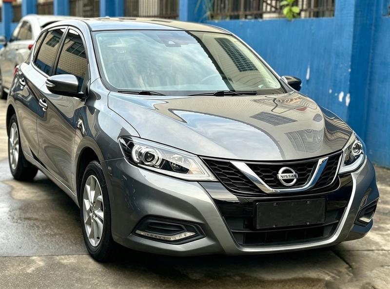 Nissan Tiida - фото 2