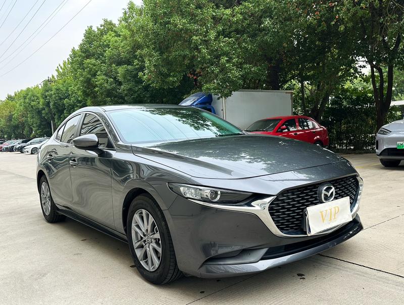 Mazda 3 - фото 2