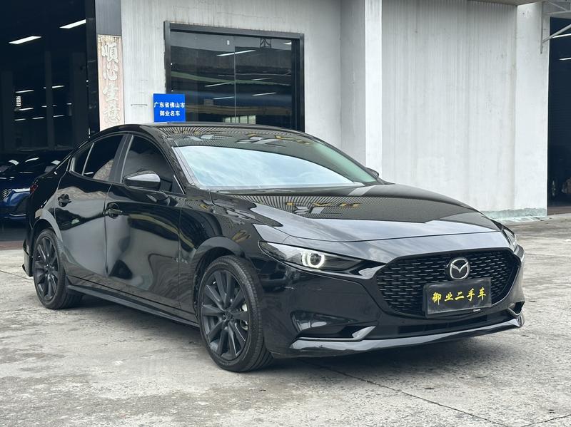 Mazda 3 - фото 2