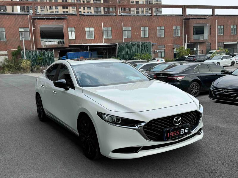 Mazda 3 - фото 2
