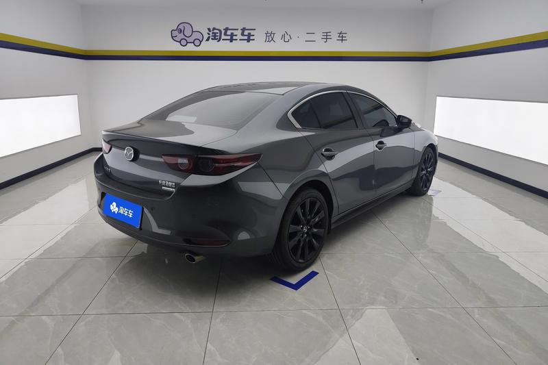 Mazda 3 - фото 2
