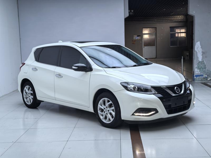 Nissan Tiida - фото 2