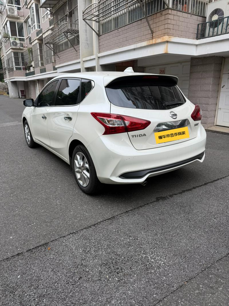 Nissan Tiida - фото 2