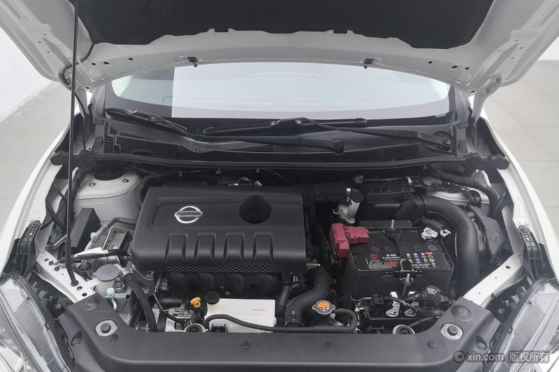 Nissan Tiida - фото 4