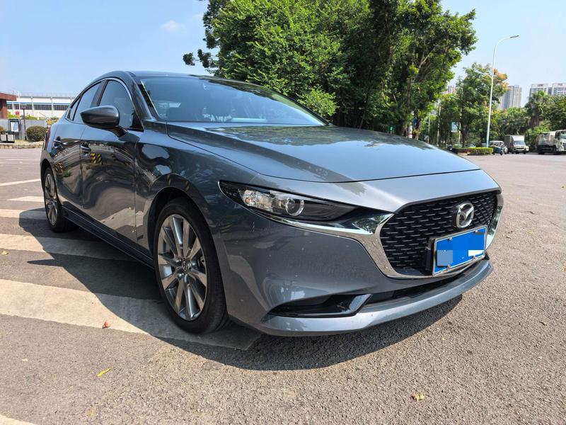 Mazda 3 - фото 2