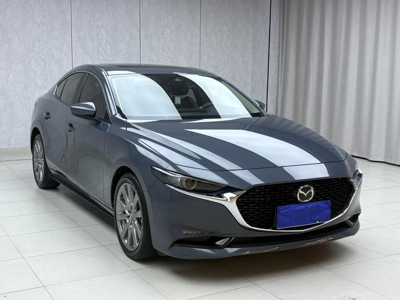 Mazda 3 - фото 2