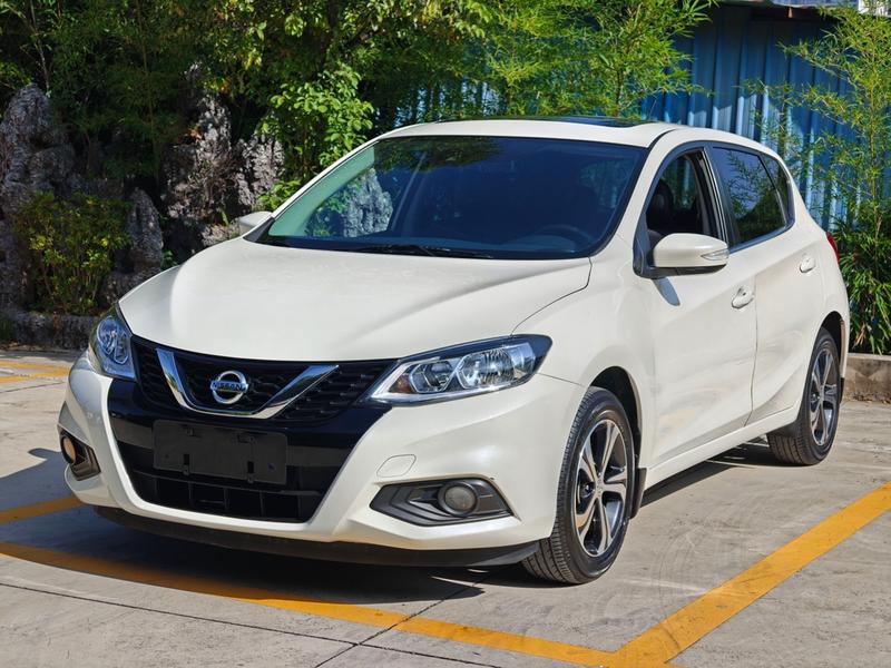 Nissan Tiida - фото 0