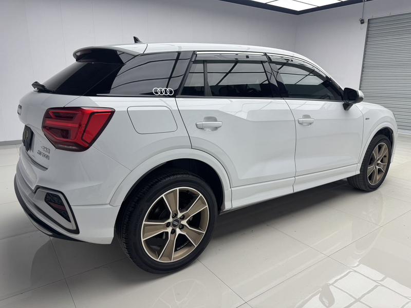 Audi Q2L - фото 3