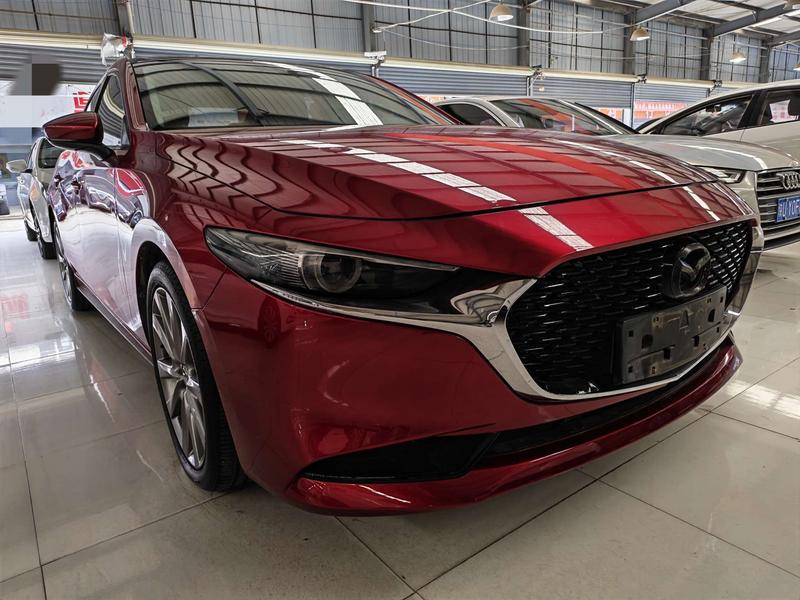 Mazda 3 - фото 2