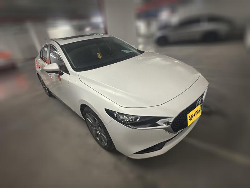 Mazda 3 - фото 2