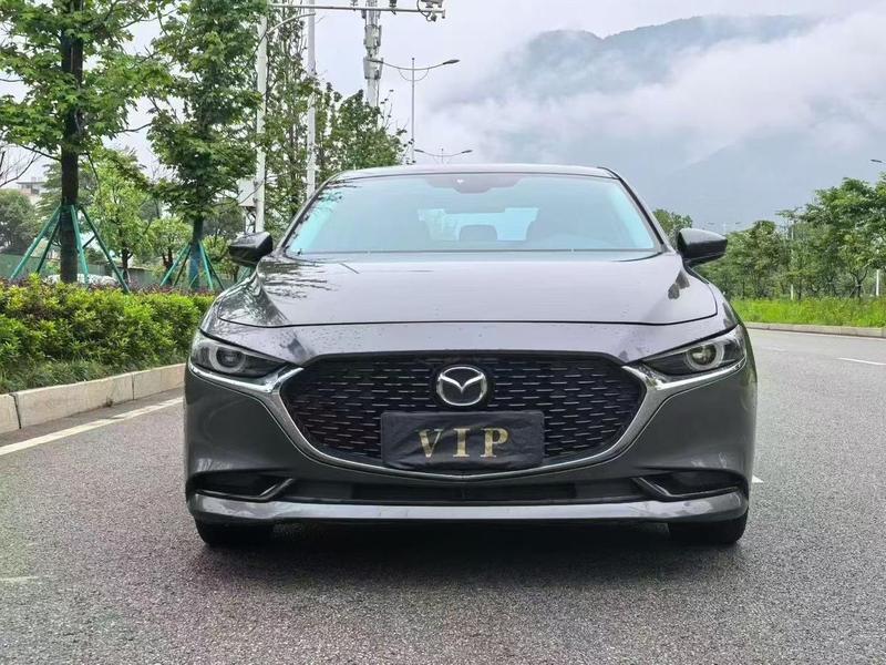 Mazda 3 - фото 1
