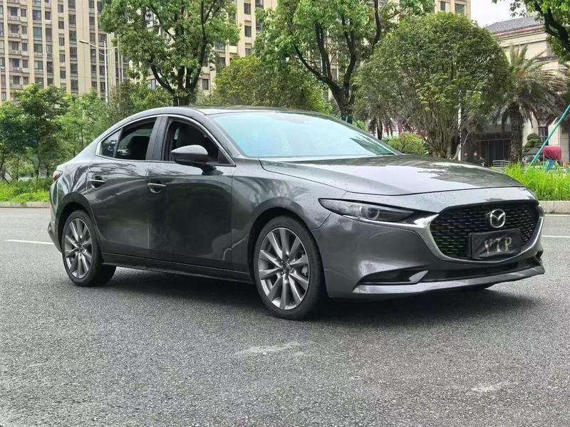 Mazda 3 - фото 2