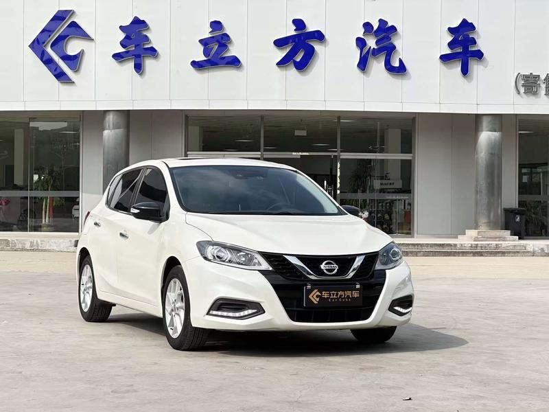 Nissan Tiida - фото 2