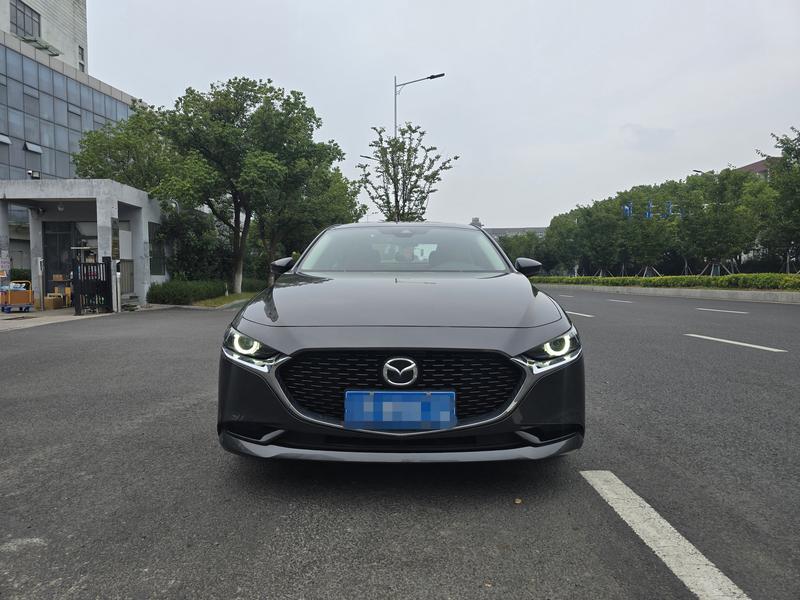 Mazda 3 - фото 1