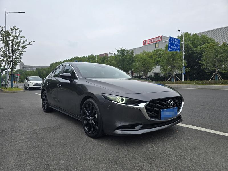Mazda 3 - фото 2