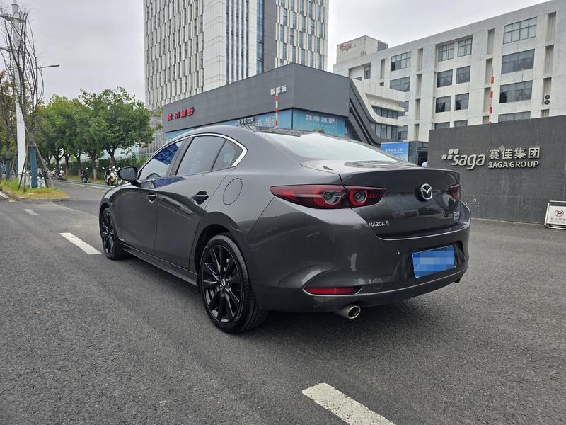 Mazda 3 - фото 4