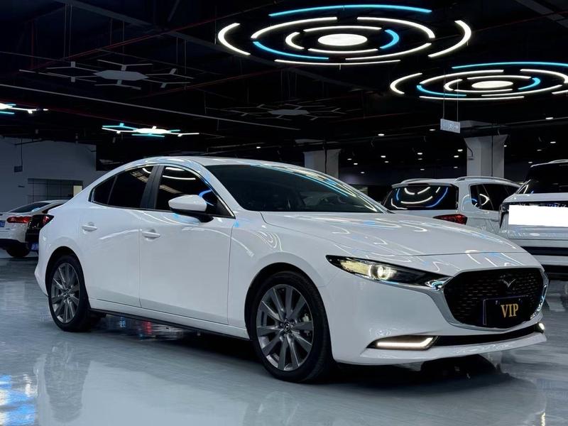 Mazda 3 - фото 2