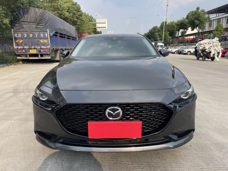 Mazda 3 - фото 1