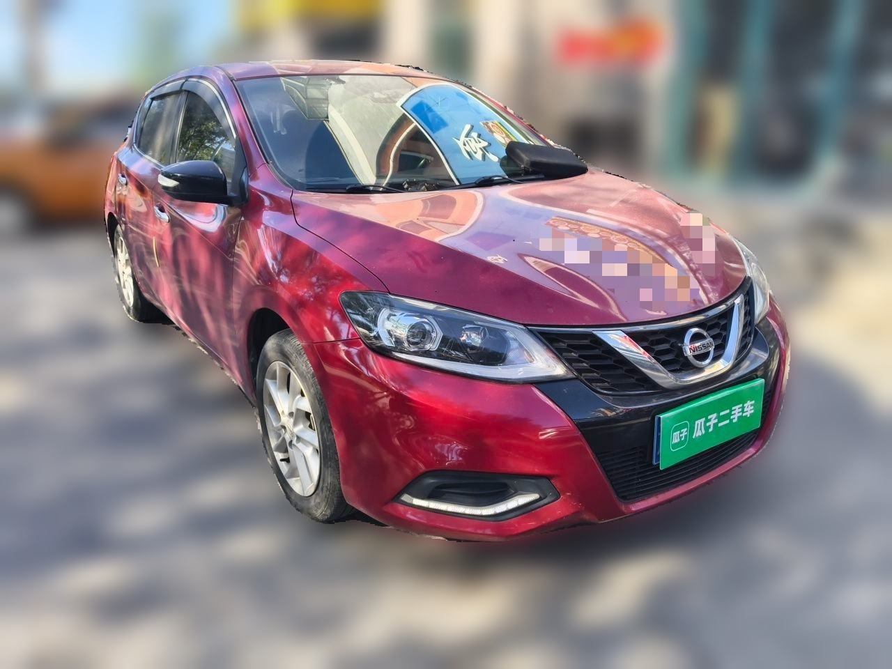 Nissan Tiida - фото 2