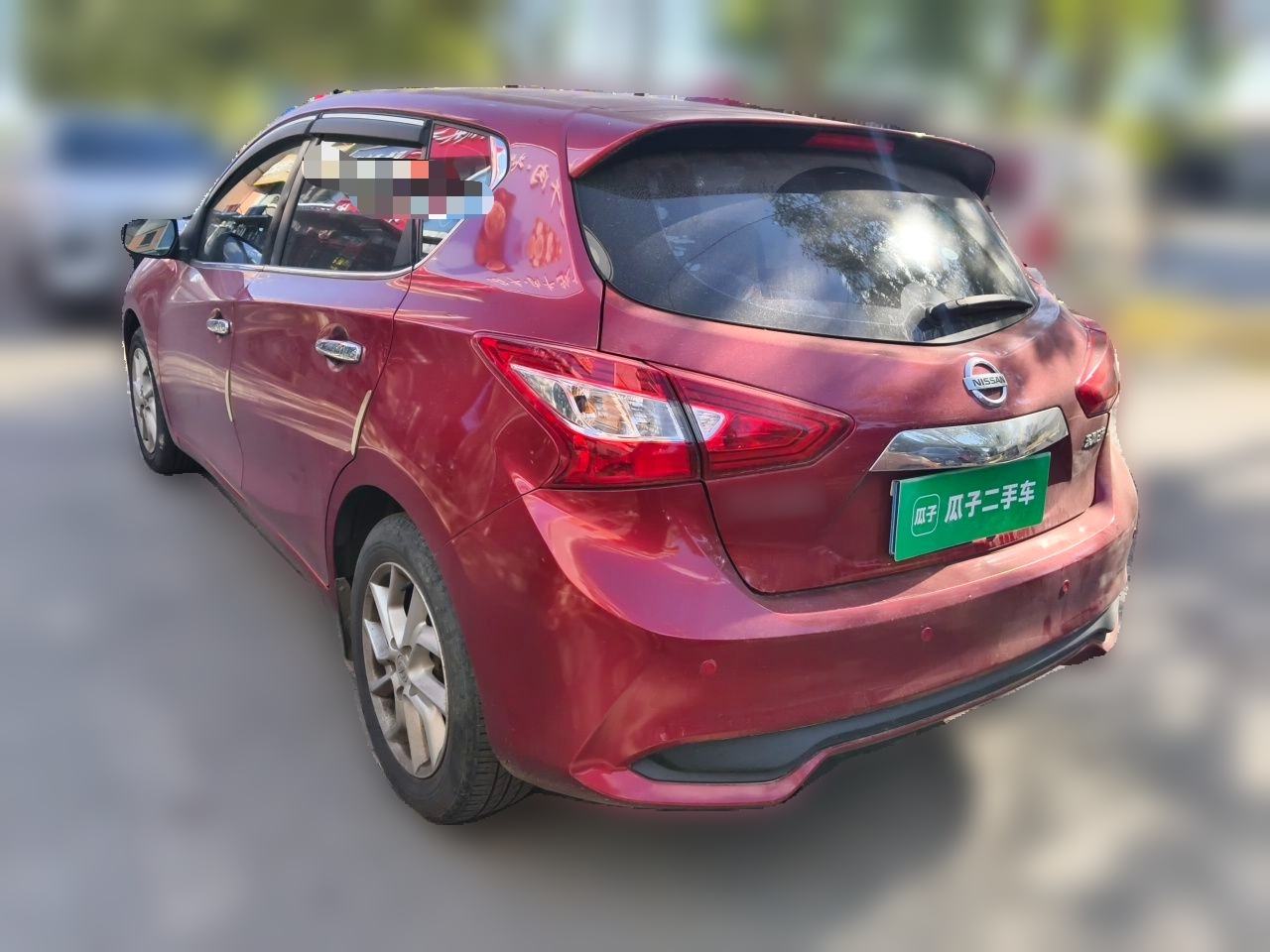 Nissan Tiida - фото 3