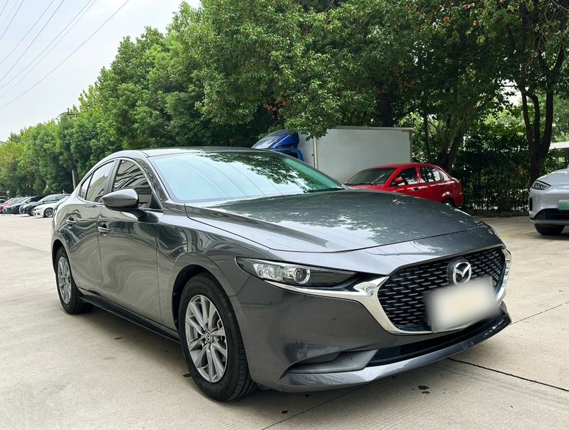 Mazda 3 - фото 2