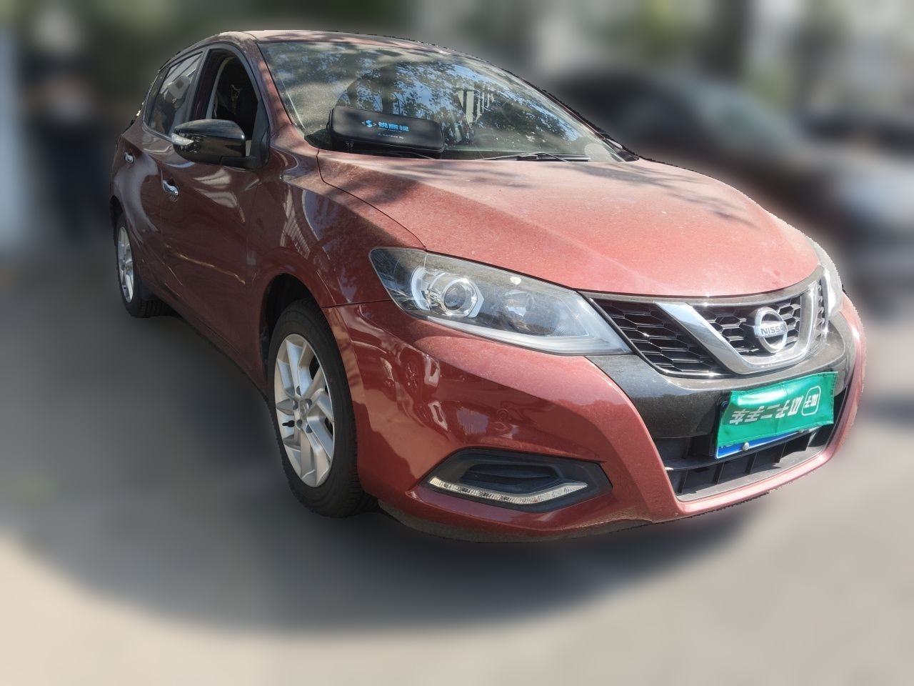 Nissan Tiida - фото 2