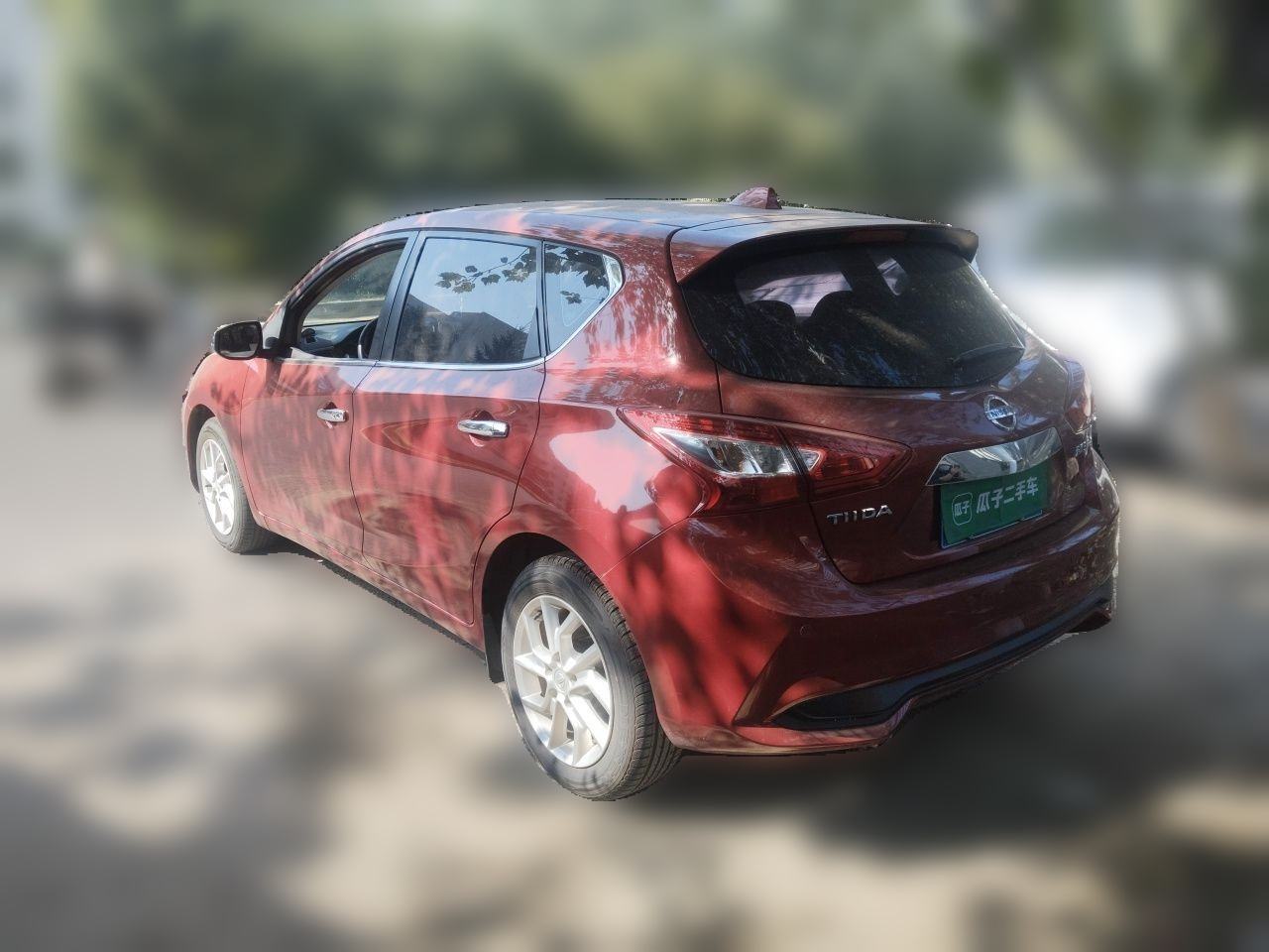 Nissan Tiida - фото 3
