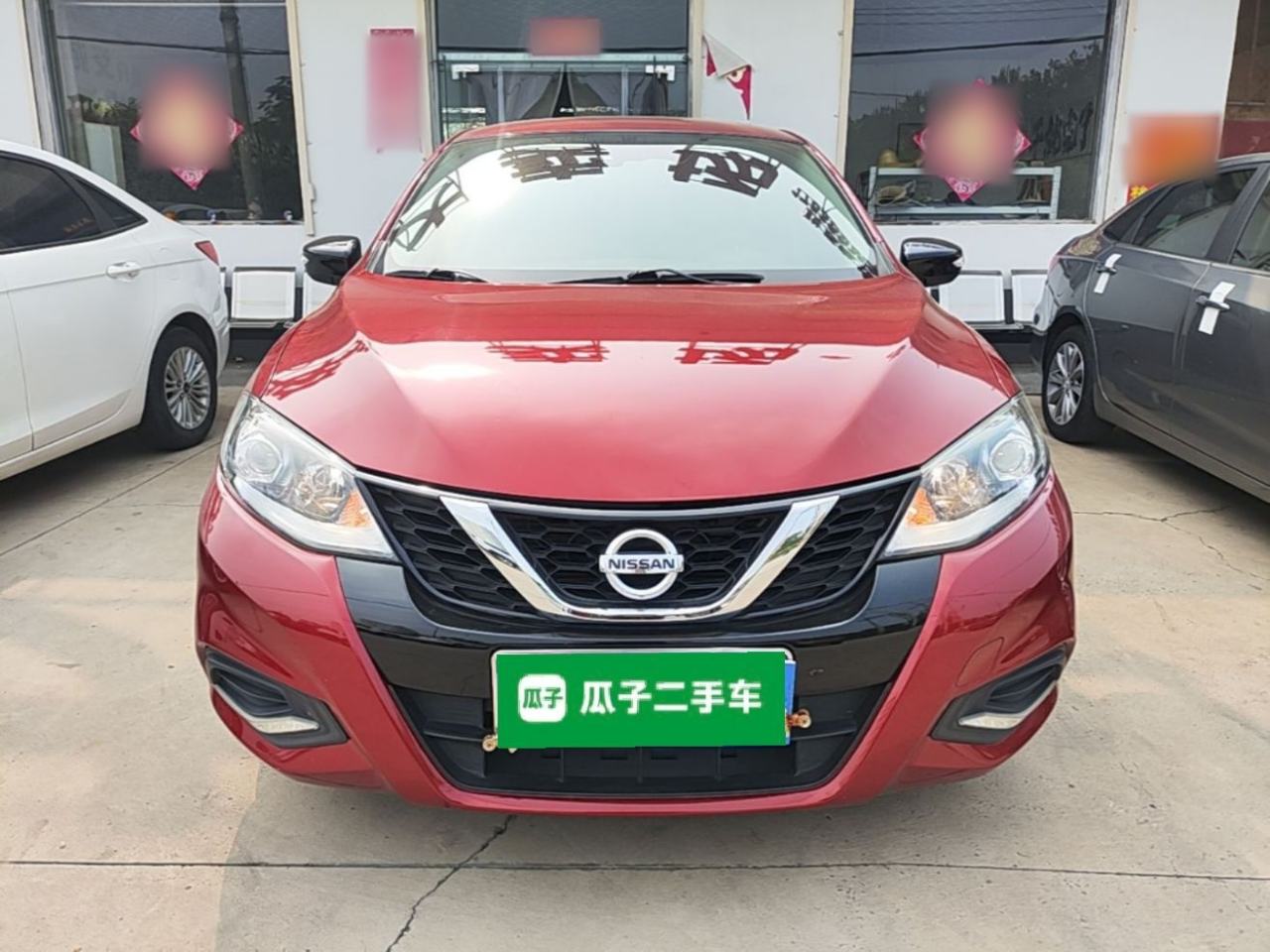 Nissan Tiida - фото 1