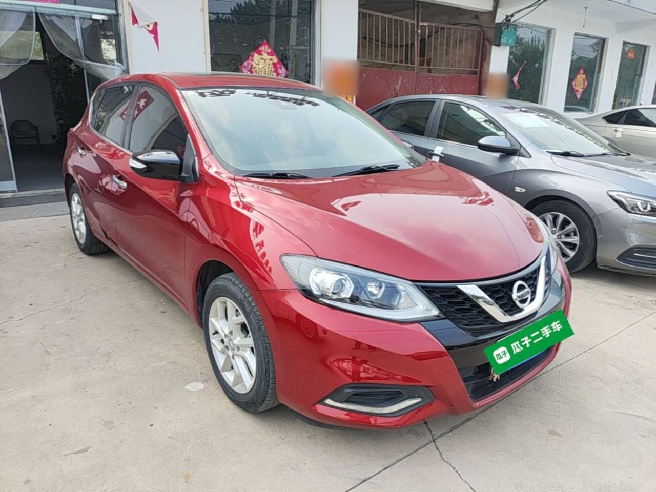 Nissan Tiida - фото 2