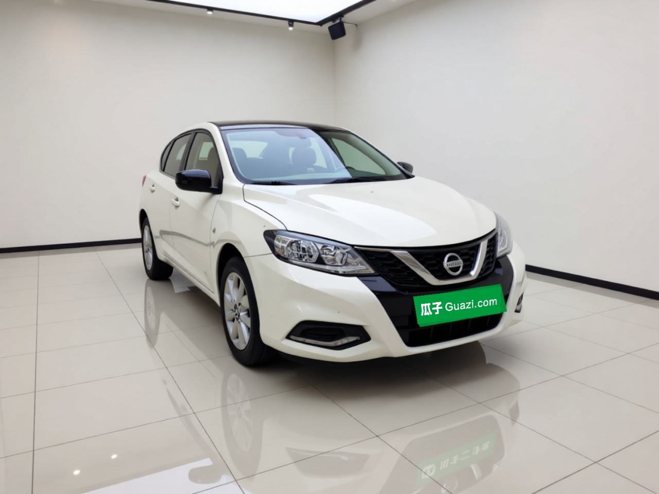 Nissan Tiida - фото 2