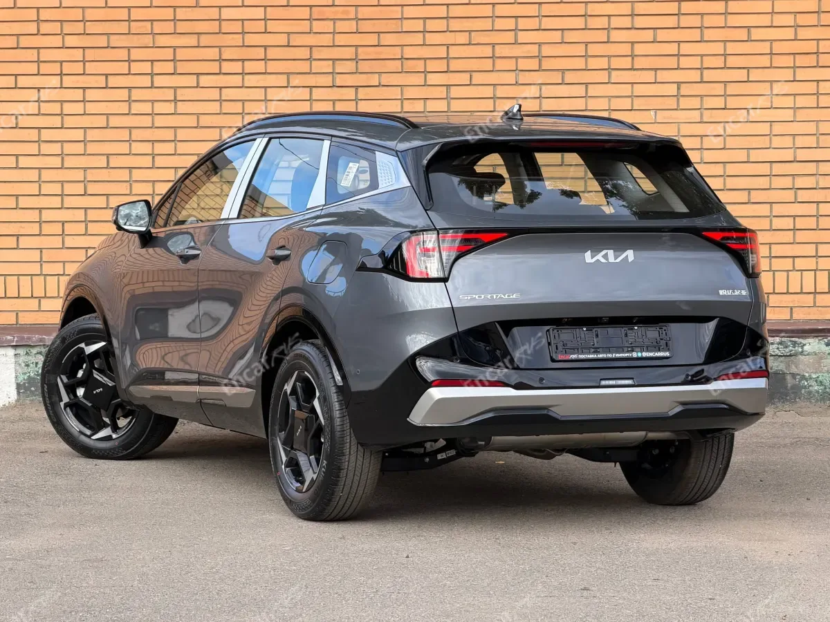 Kia Sportage 2026 — задняя часть слева
